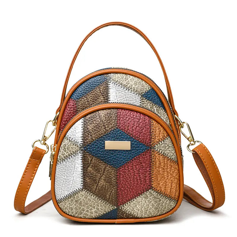 🎁2025 Nuova borsa da donna alla moda realizzata in vera pelle colorblock