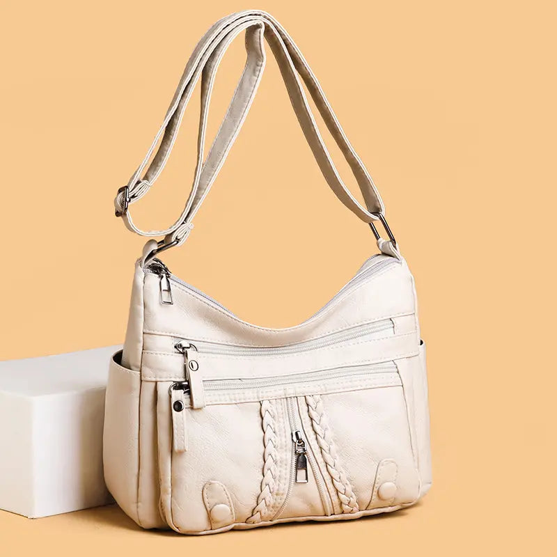 🔥【Acquista 1 e ricevi 1 gratis】Nuova borsa da donna 2025 con più tasche, grande capacità, può essere portata su una spalla o a tracolla.
