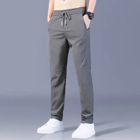 😎【M-5XL】2025 Nuovi pantaloni casual elastici da uomo