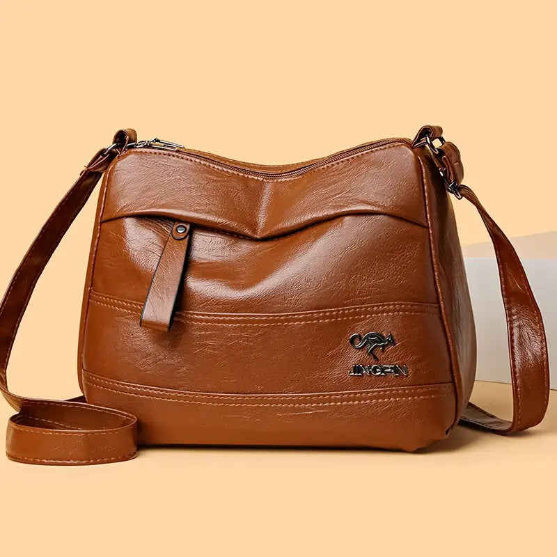 👜Nuova borsa a tracolla multistrato retrò con grande capacità, alla moda e versatile