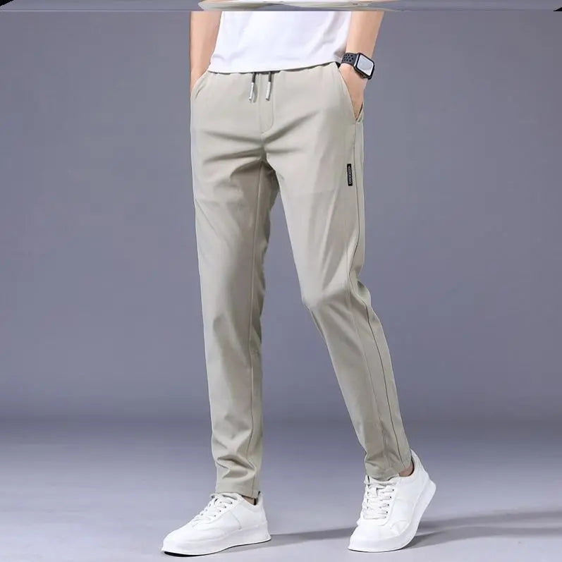 😎【M-5XL】2025 Nuovi pantaloni casual elastici da uomo
