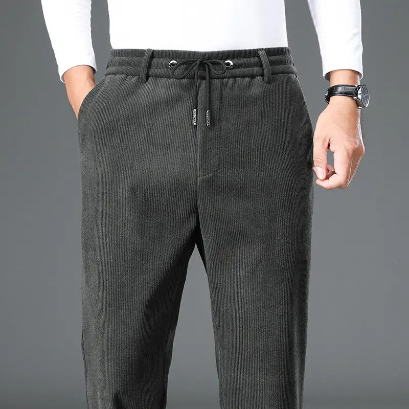 👖【Tamanhos L-5XL】Calça de moletom de veludo plus size para homem, ideal para o outono e inverno. Calça casual larga.