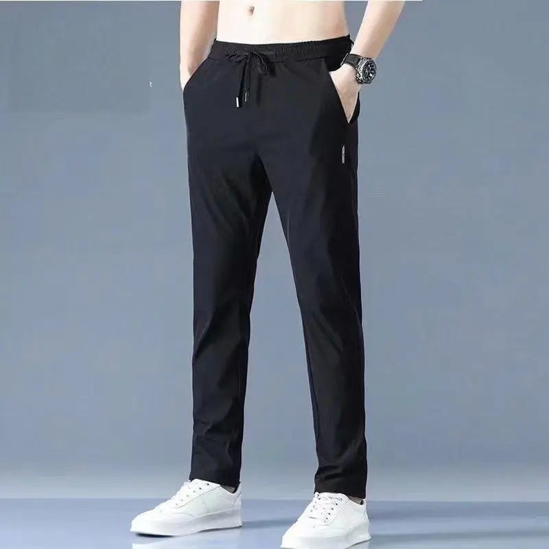 😎【M-5XL】2025 Nuovi pantaloni casual elastici da uomo