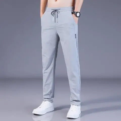 😎【M-5XL】2025 Nuovi pantaloni casual elastici da uomo